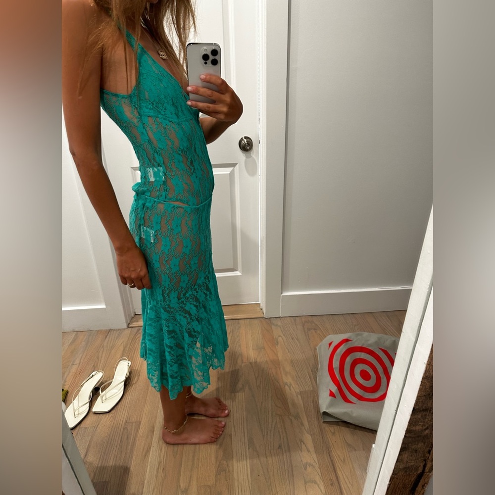 Gimagaus body suit and low rise skirt Teal. Size S. Worn once. Sold as a set